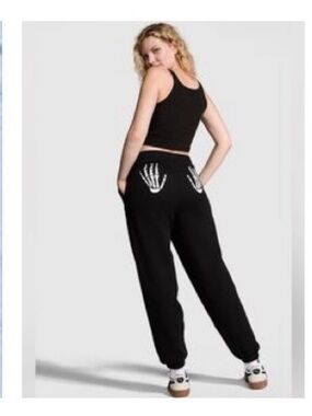 Nwt PINK 🖤 sweatpants with skeleton back